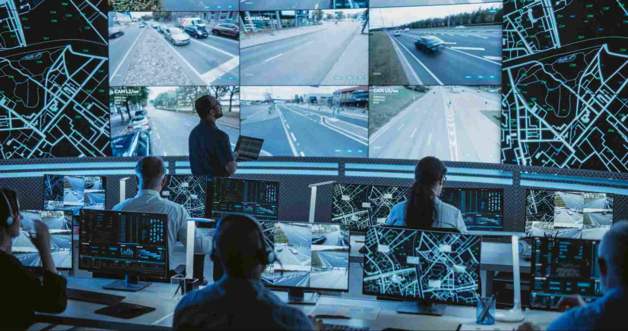 Emergency operations center monitoring live data and communications systems, illustrating the reliable connectivity and real-time coordination supported by fiber internet for critical services.