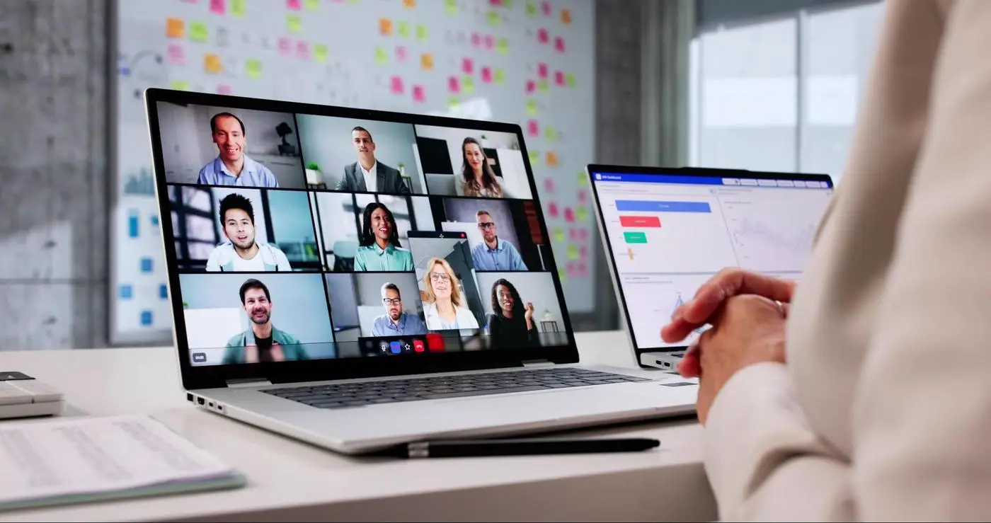 Virtual meeting on a laptop, showing how fiber provides reliable internet connectivity during Alberta winters.