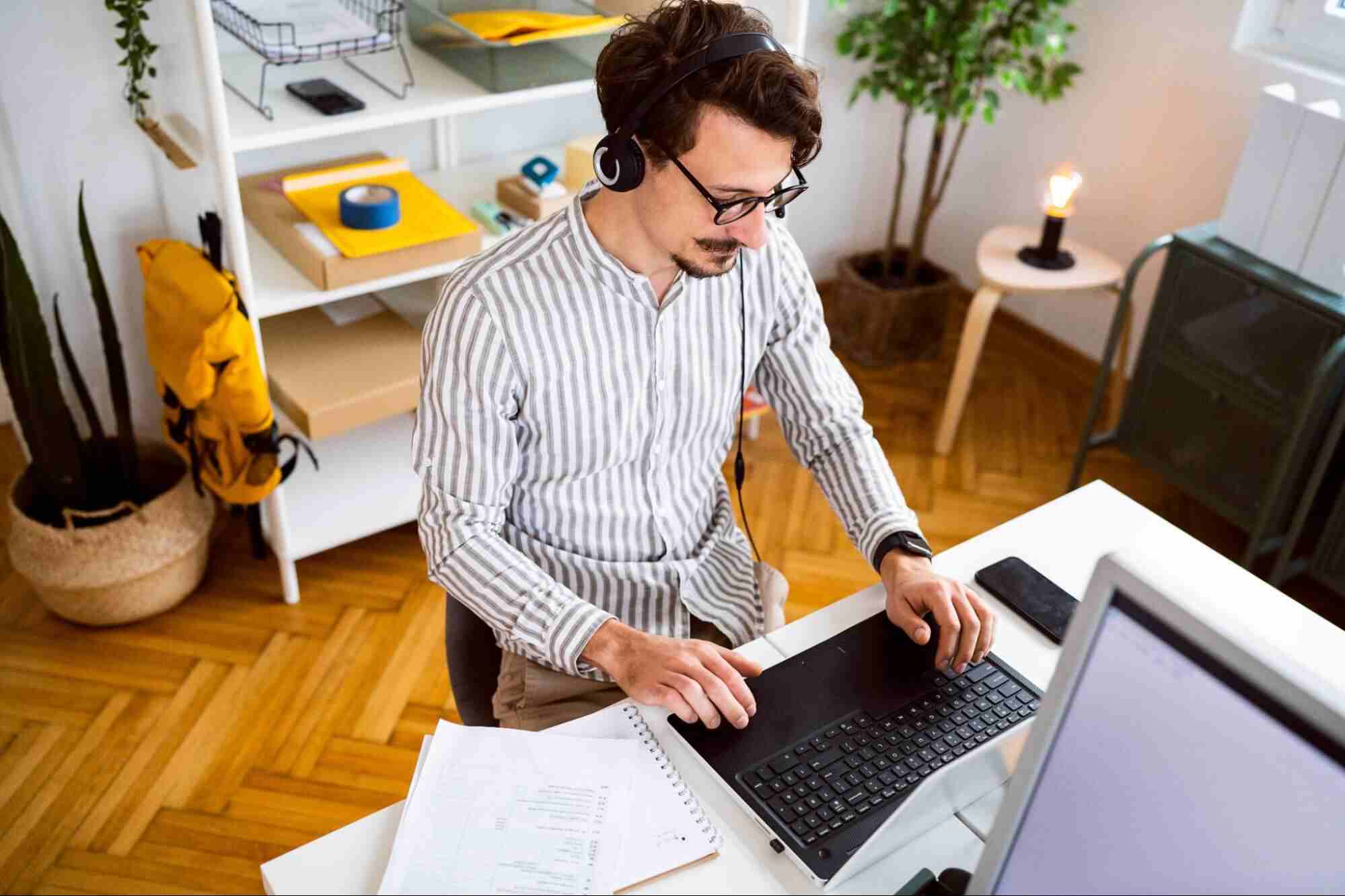 Remote professional working from home with a reliable fiber internet connection, illustrating why fiber internet is worth it for everyday productivity.