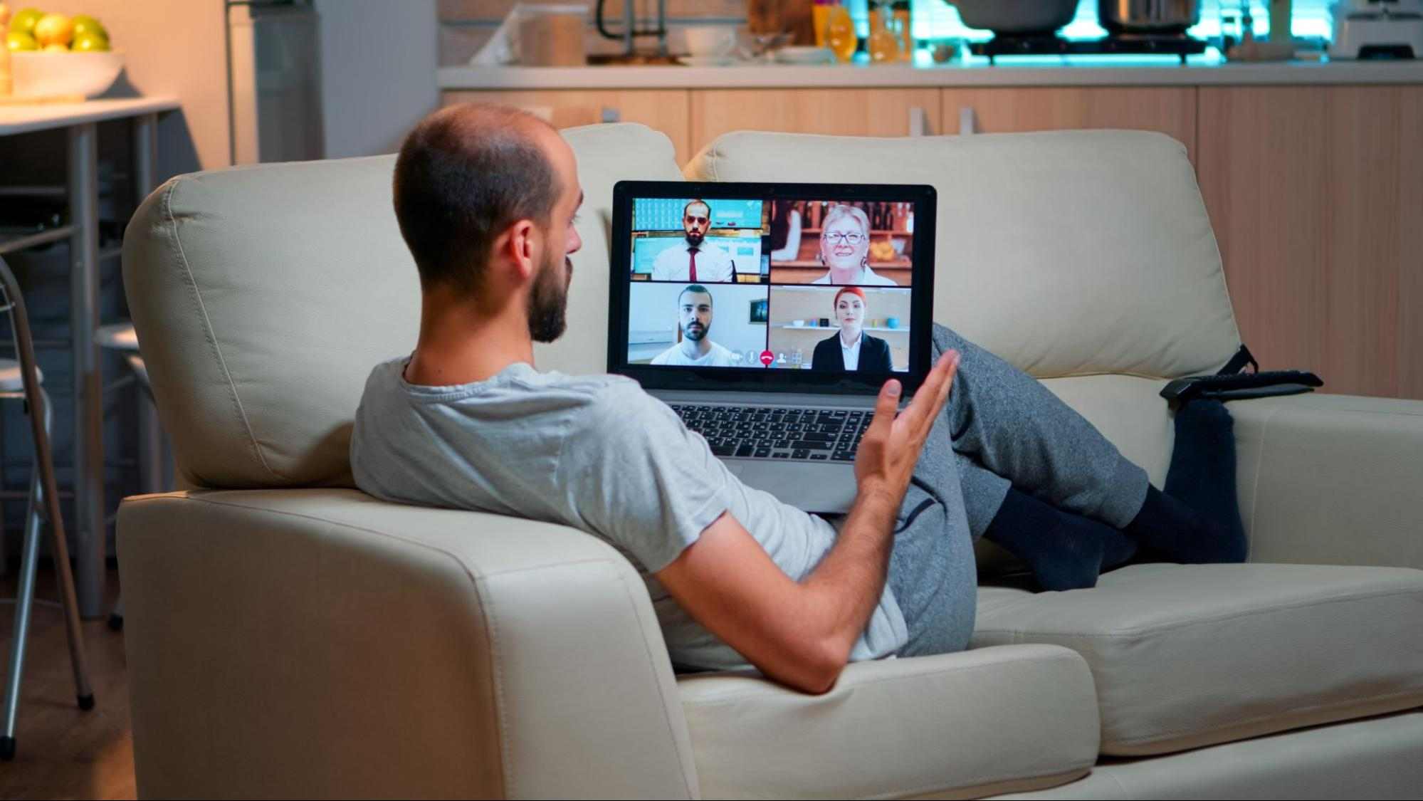 Alberta homeowner using a laptop for a video call with a high-speed internet connection.