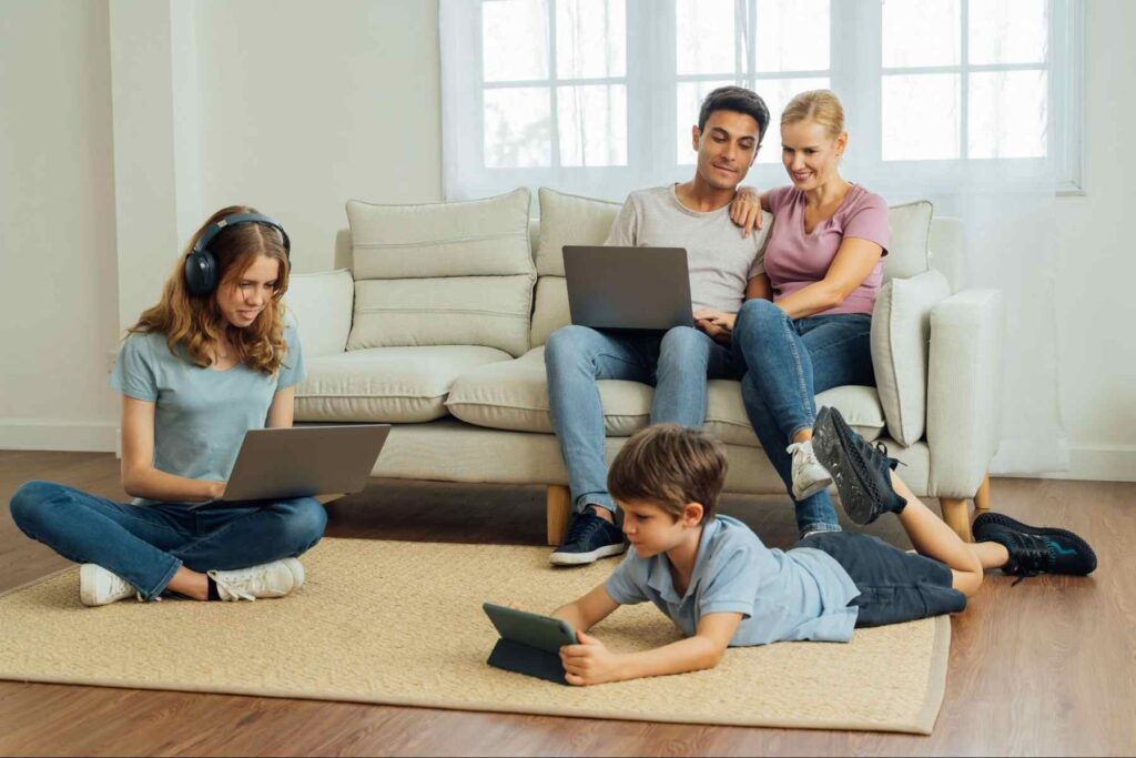 Family using multiple devices at once on their home internet connection.